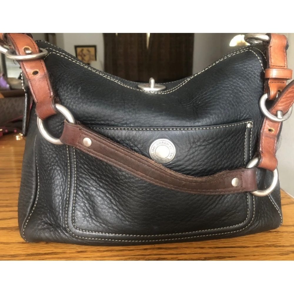 Vintage Coach Turnlock shoulder bag.  Black pebbled leather bag with brown strap